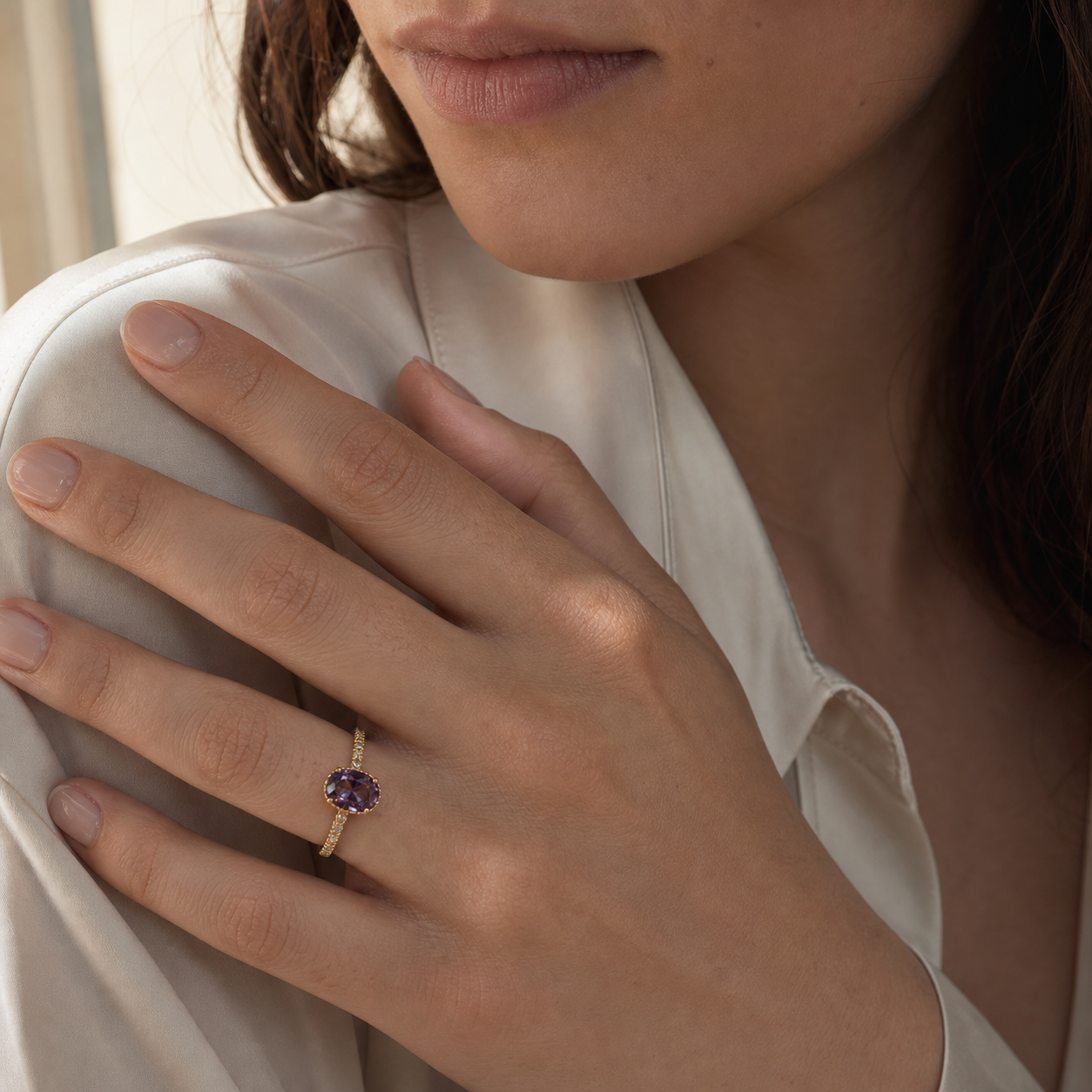 Amethyst Oval Solitaire Ring worn in a natural editorial portrait
