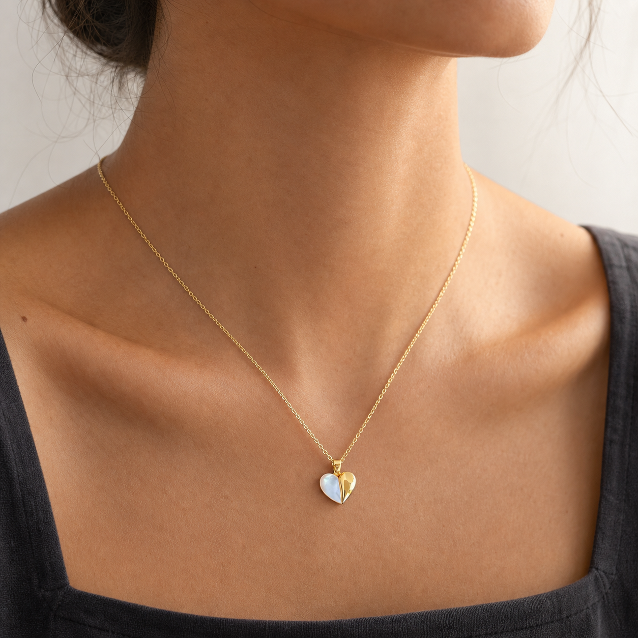Heartfold Shell Pendant Necklace worn in a natural editorial portrait