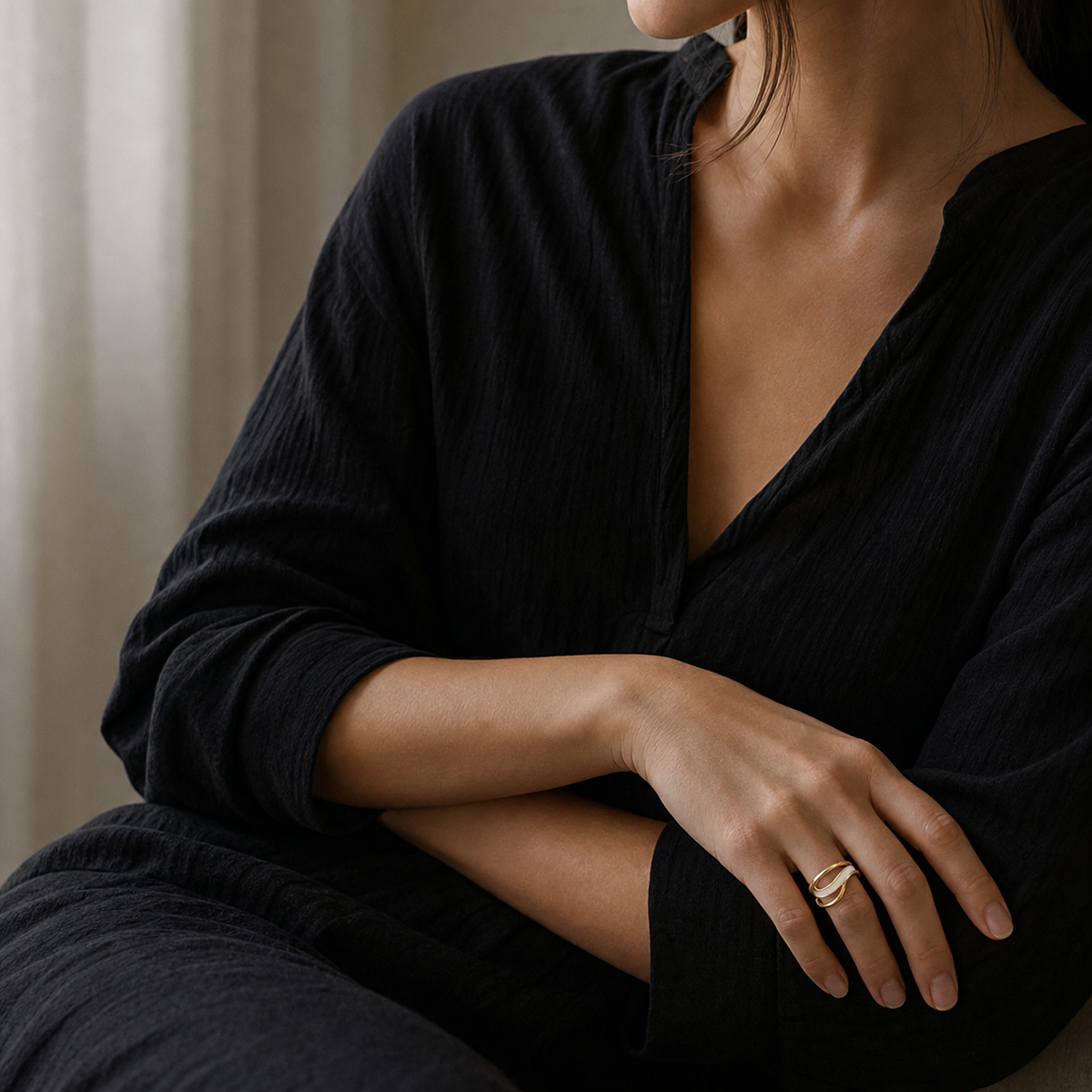 A second photographic styling view of Ivory Loop Open Ring
