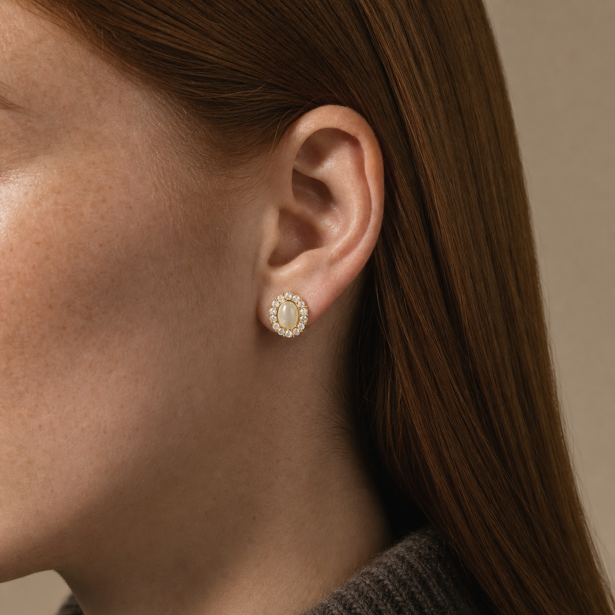 Pale Gaze Halo Stud Earrings worn in a natural editorial portrait
