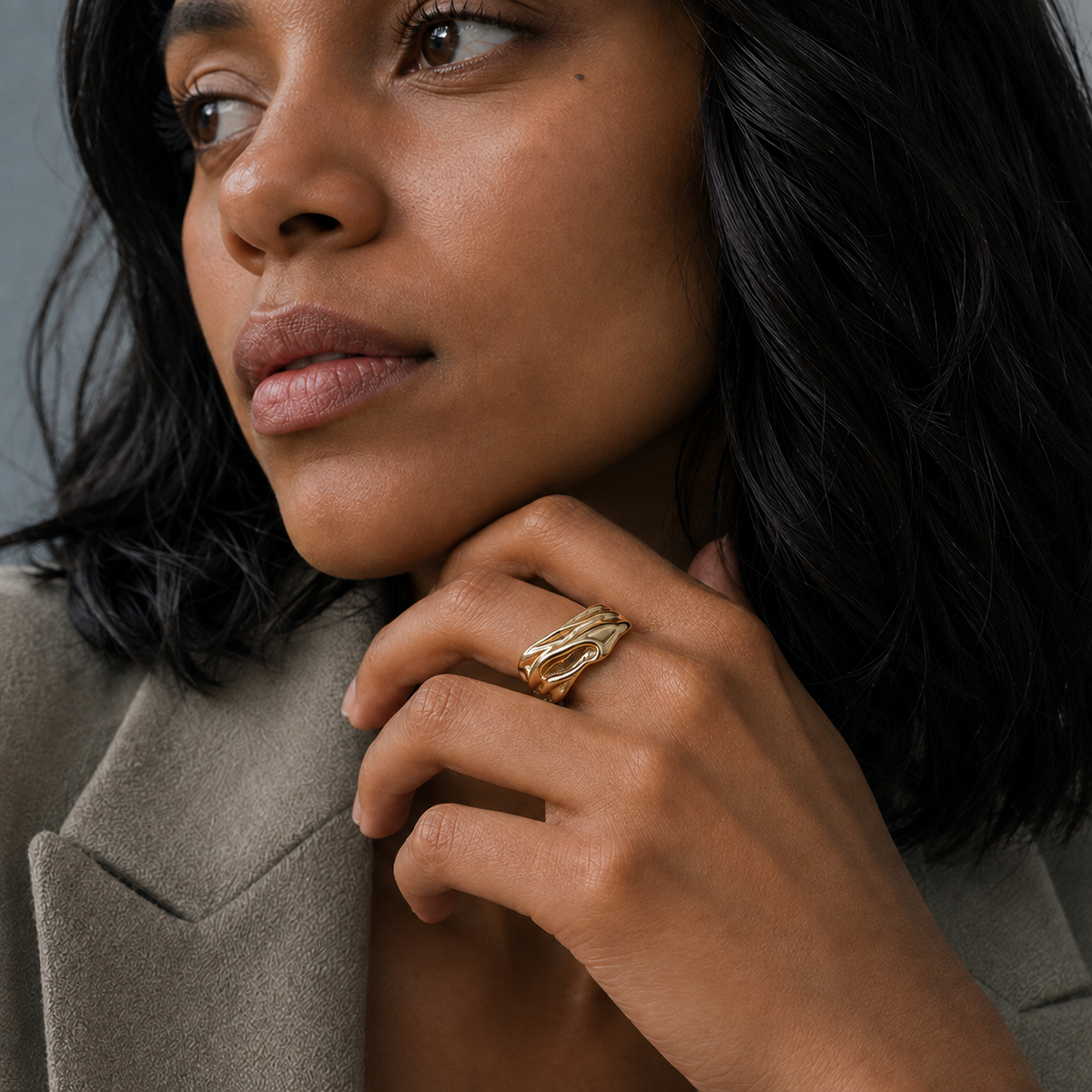 Riverfold Open Ring worn in a shoulder-to-waist turning editorial view