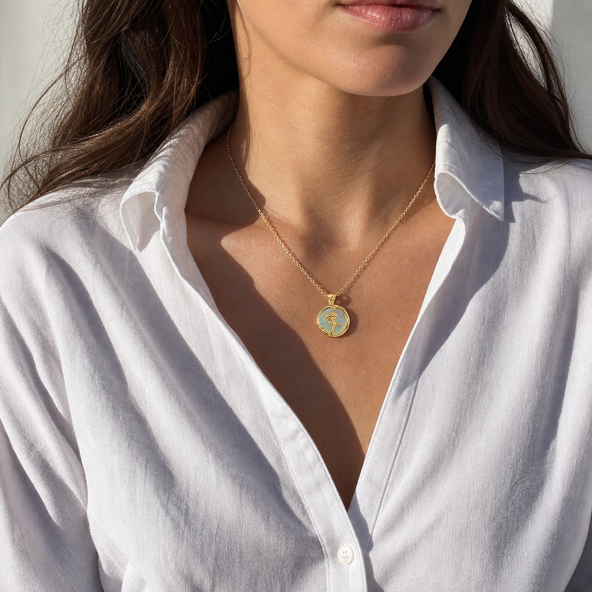 A second photographic styling view of Rose Seal Shell Pendant Necklace