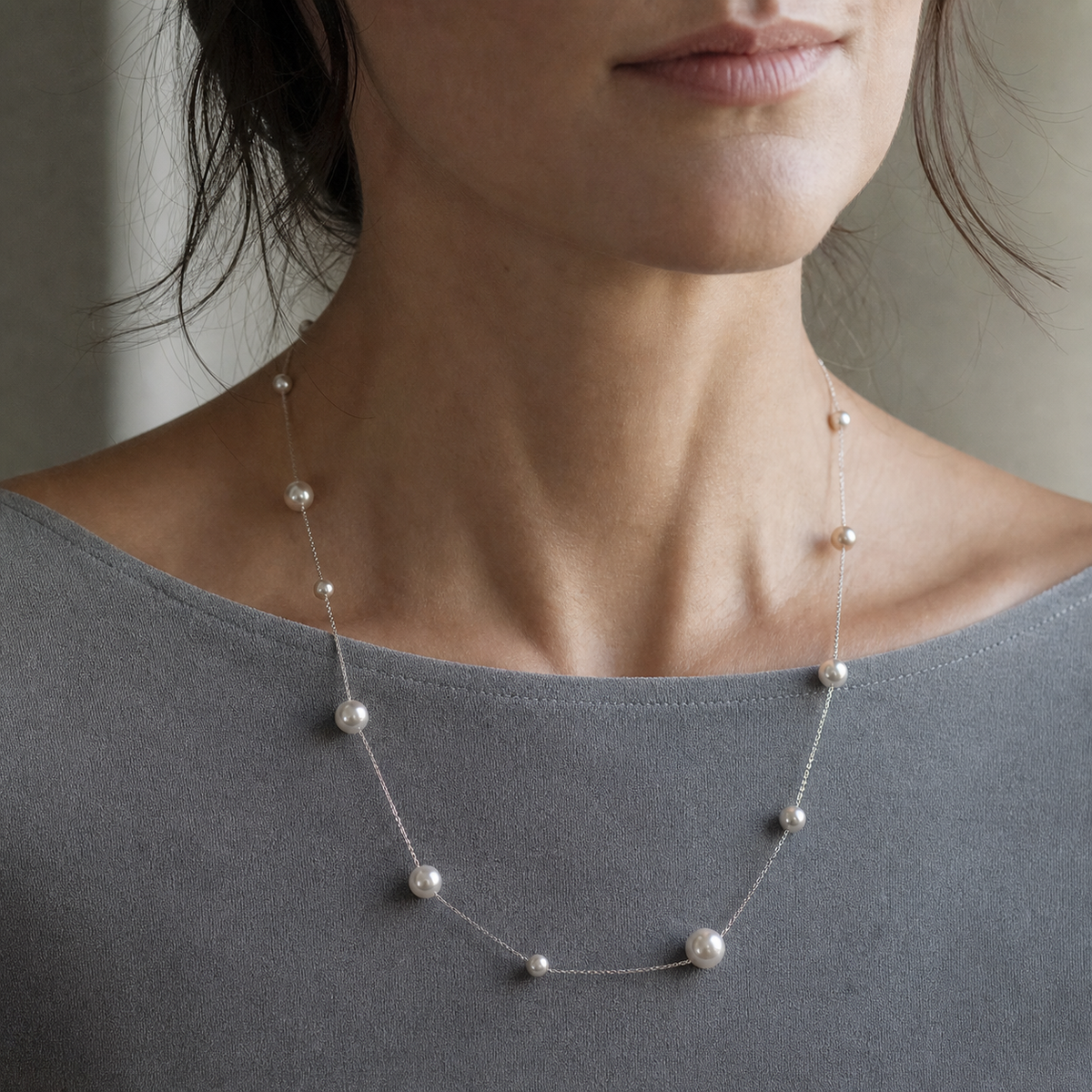 Scattered Pearl-Line Necklace worn in a natural editorial portrait