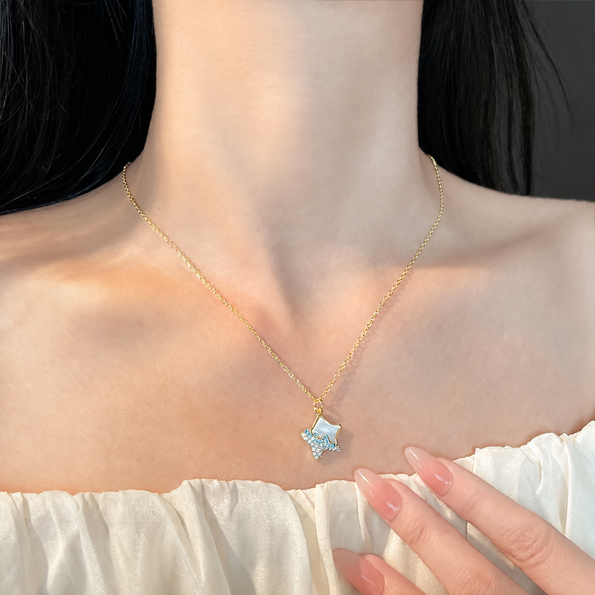 Seafoam Point Necklace worn in a natural editorial portrait