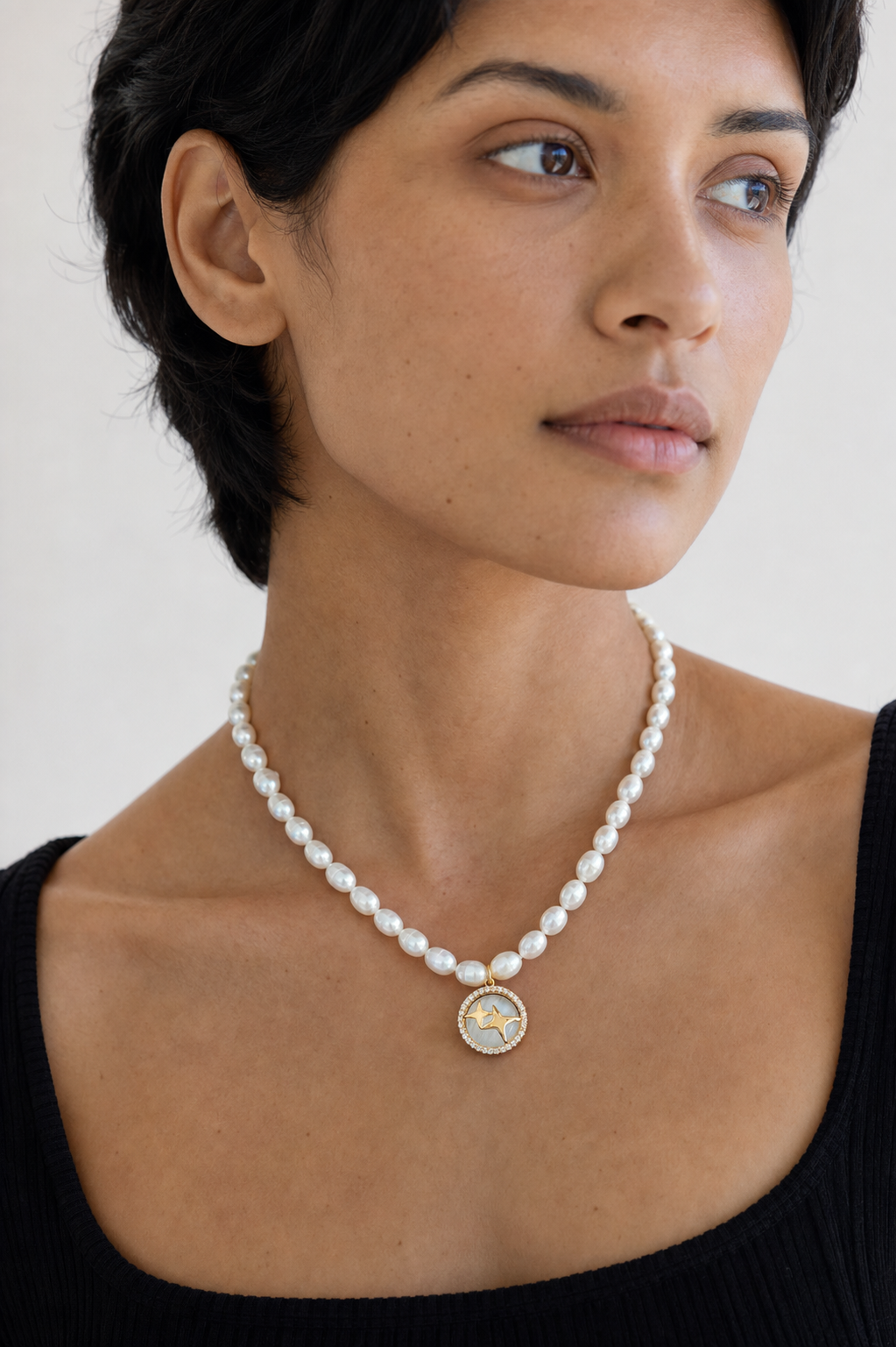 Starward Strand Necklace worn in a natural editorial portrait