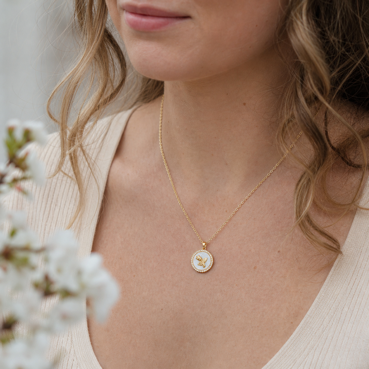 Tulip Seal Shell Pendant Necklace worn in a natural editorial portrait