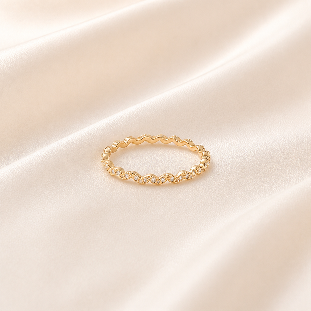 Twisted Dew Ring styled on Moonveil warm cream silk