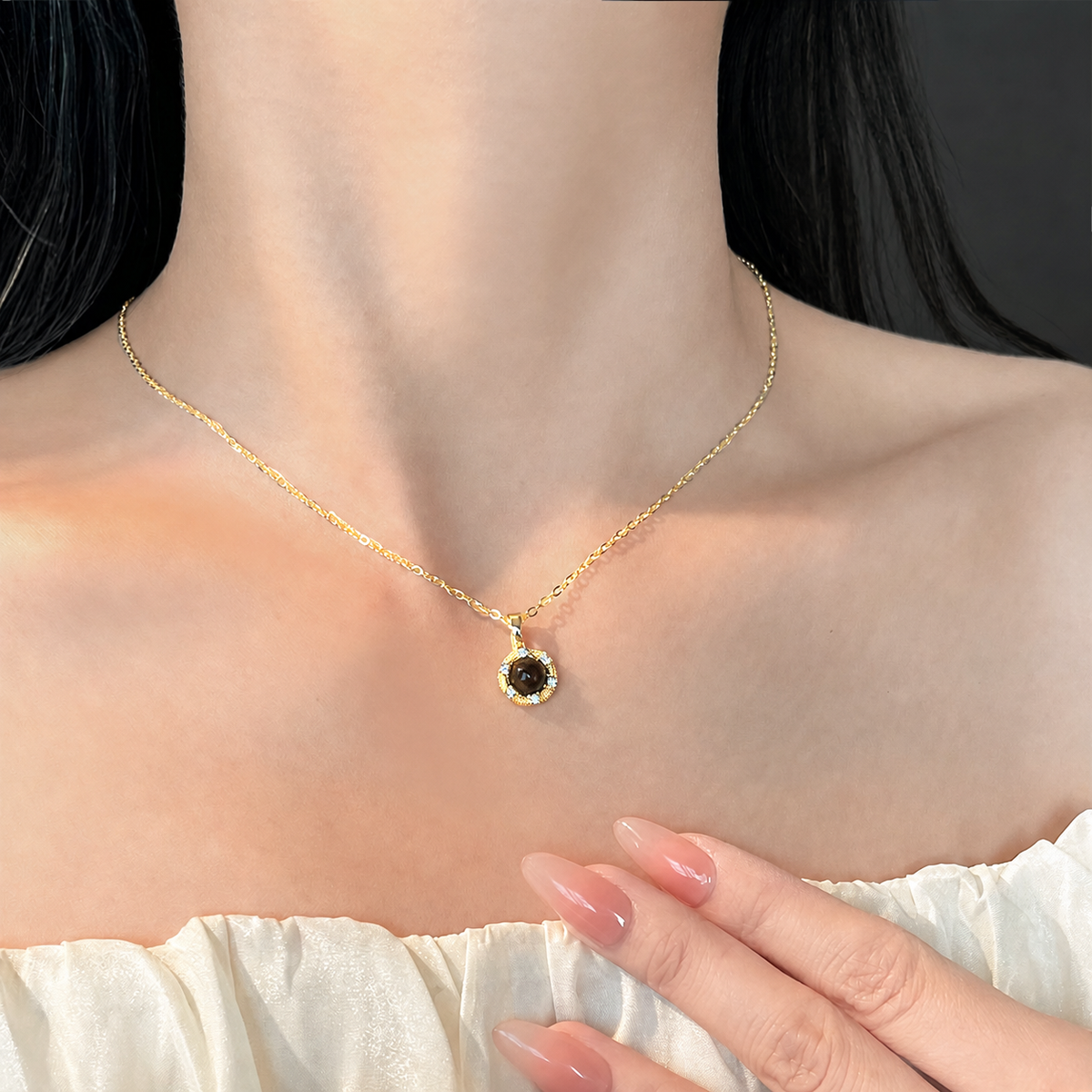 A second photographic styling view of Umber Observatory Pendant Necklace