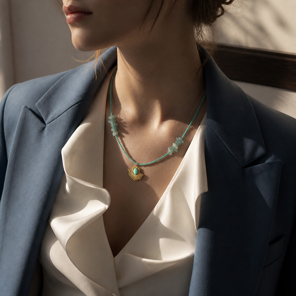 A second photographic styling view of Blue Sunfan Necklace