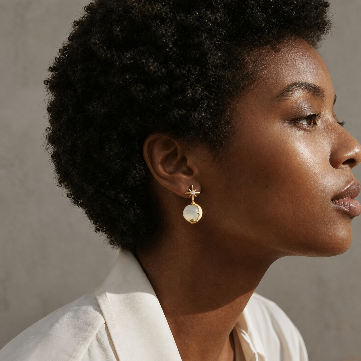 A second photographic styling view of Celestial Whisper Drop Earrings