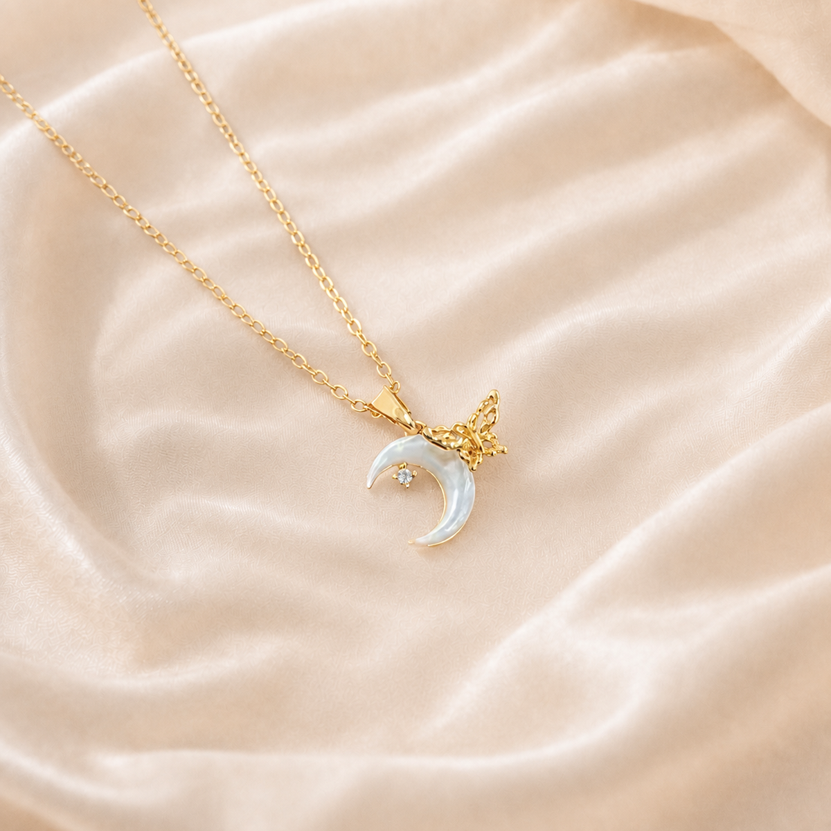 Crescent Wing Shell Pendant Necklace styled on Moonveil warm cream silk