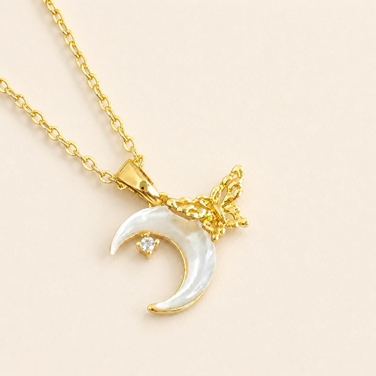 Close-up of Crescent Wing Shell Pendant Necklace showing its design and finish