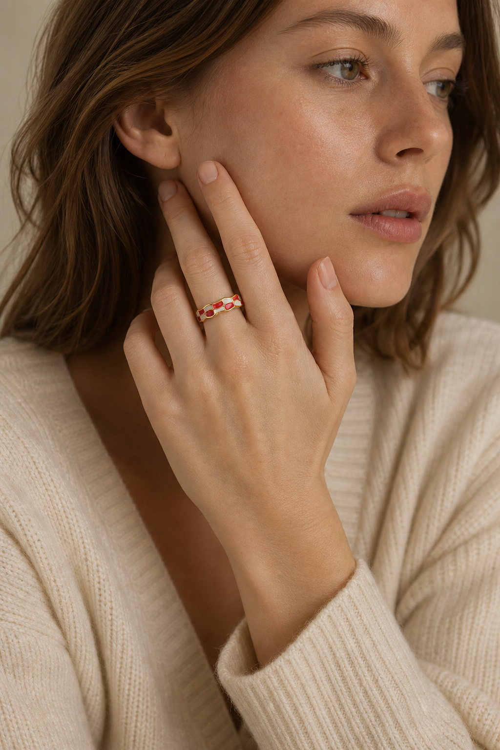 Crimson Current Ring worn in a natural editorial portrait
