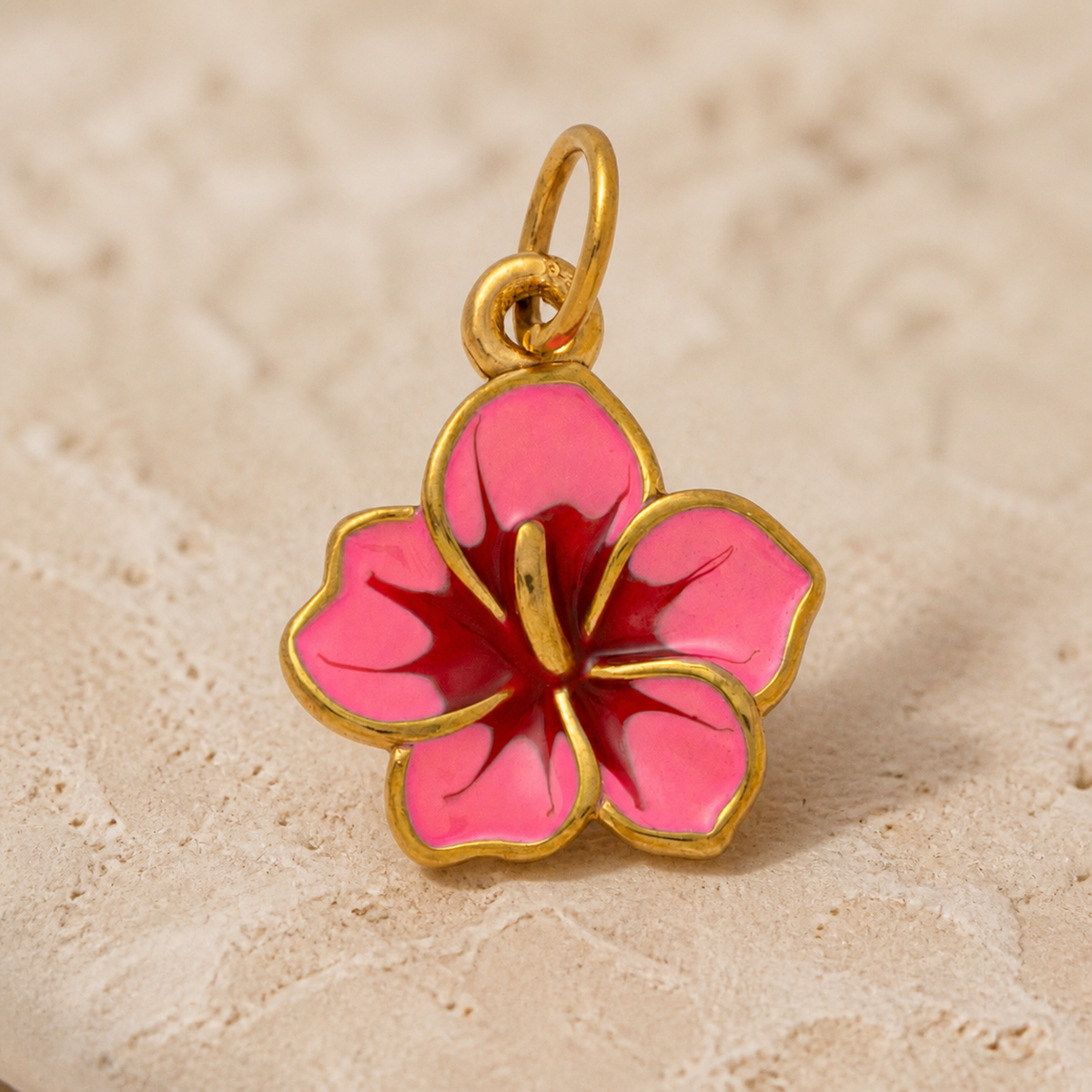 Close-up of Fuchsia Bloom Charm showing its design and finish
