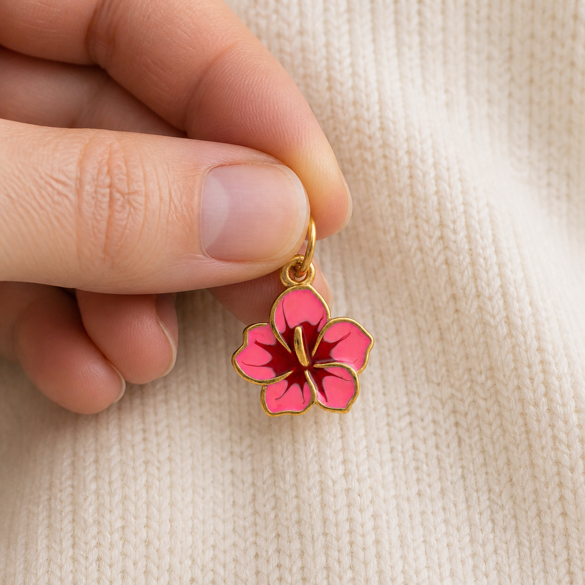 Fuchsia Bloom Charm worn in a natural editorial portrait