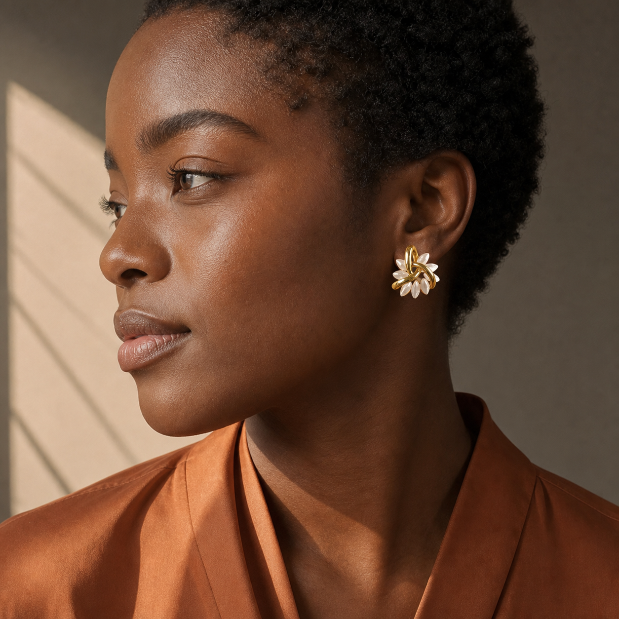 A second photographic styling view of Ginkgo Cluster Stud Earrings