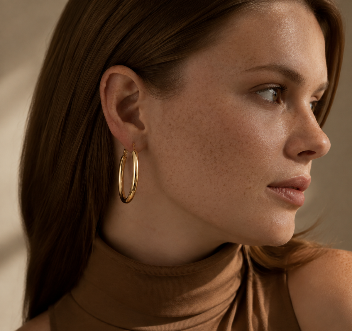 Second editorial wearing view of Heatfold Hoop Earrings