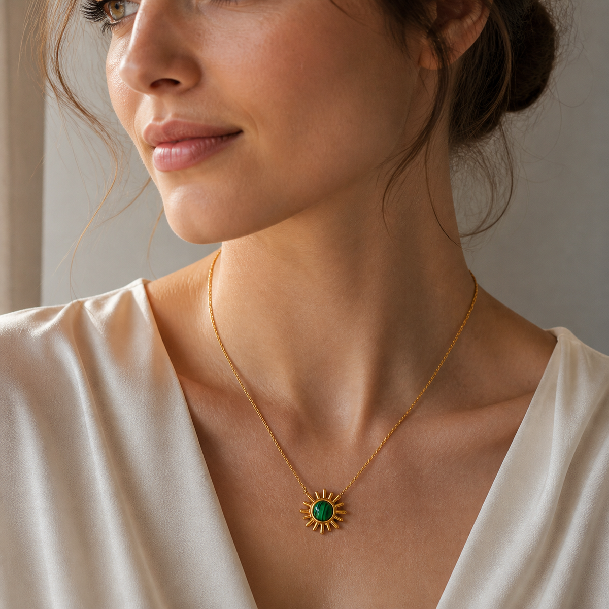 Green Sunpoint Necklace worn in a natural editorial portrait