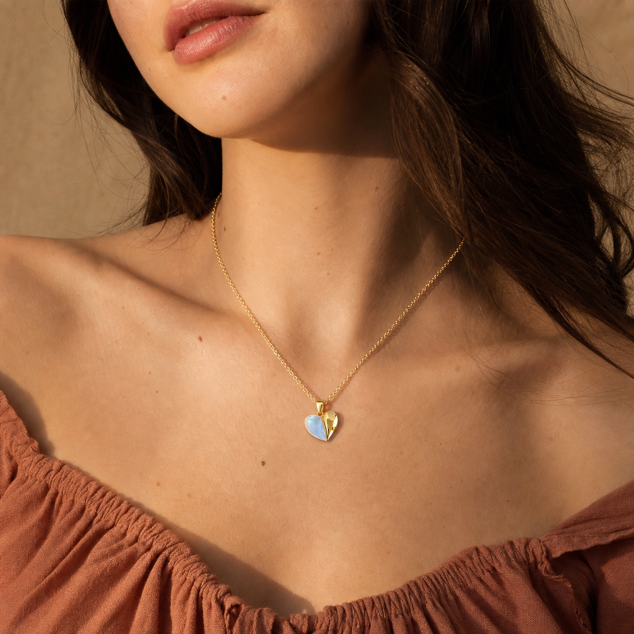 A second photographic styling view of Heartfold Shell Pendant Necklace