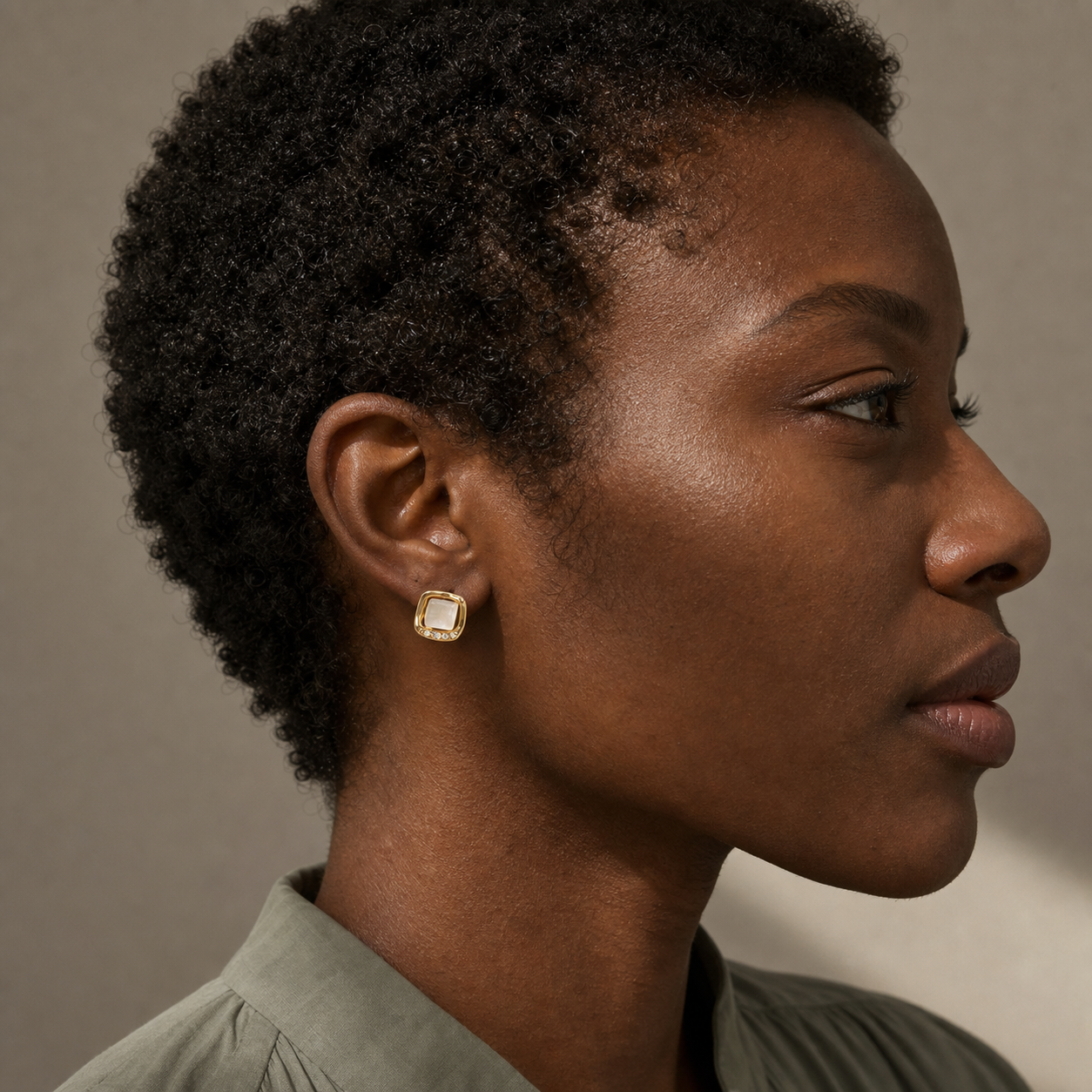 A second photographic styling view of Lattice Window Stud Earrings