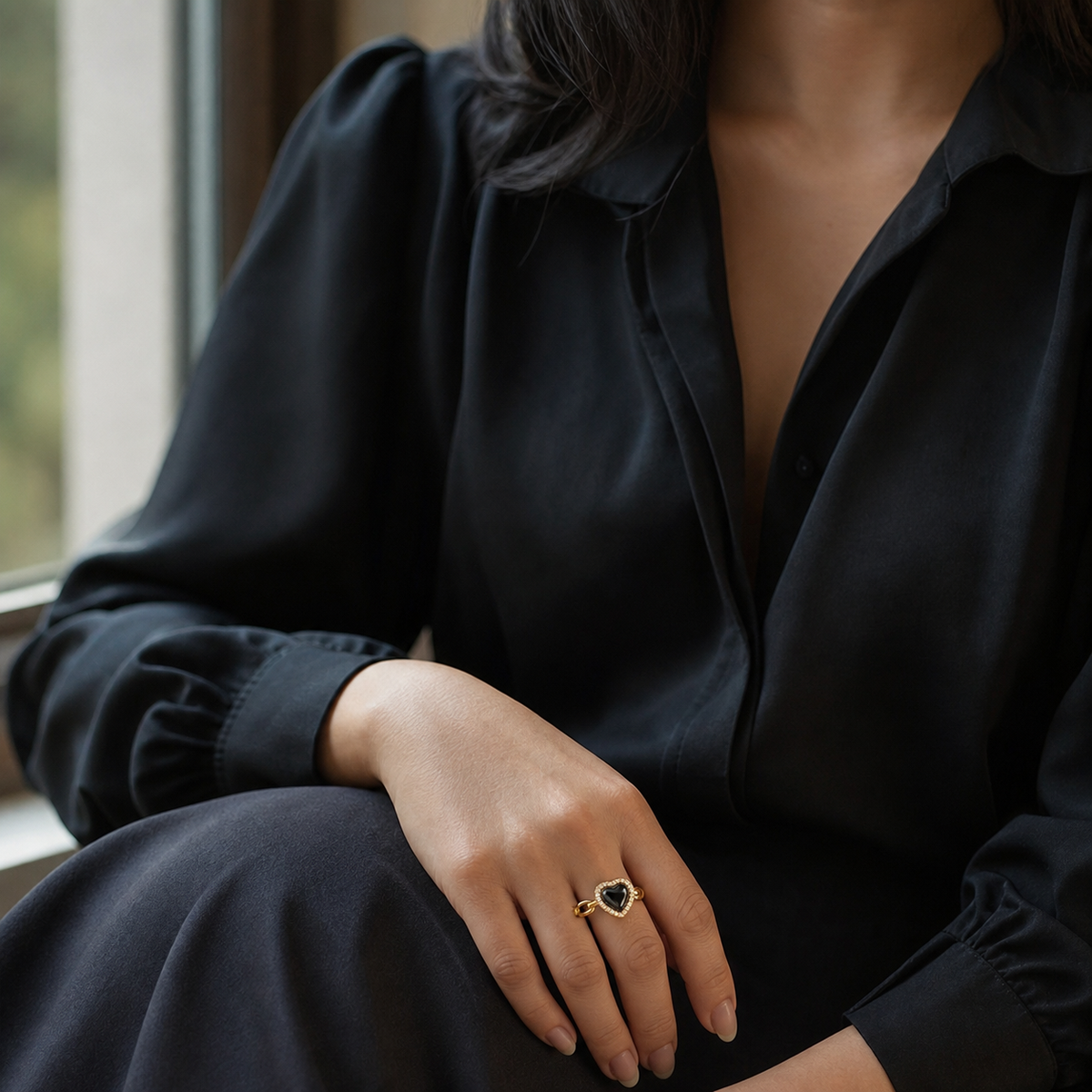A second photographic styling view of Midnight Heart Open Ring