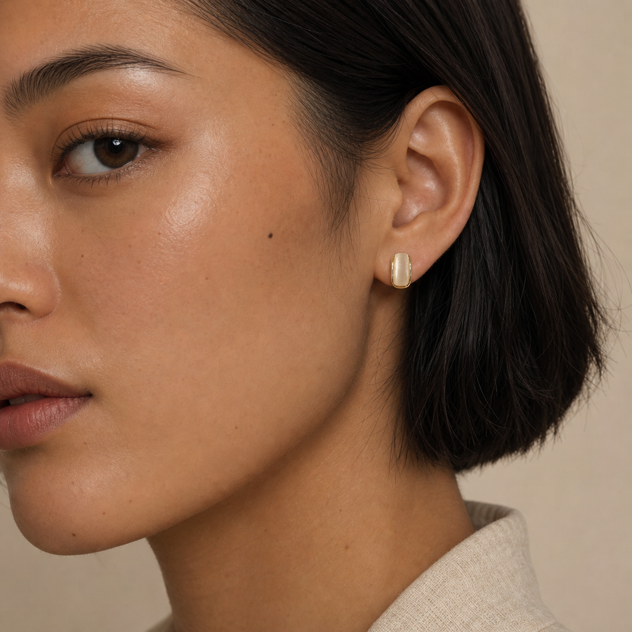 Moonlit Arc Stud Earrings worn in a natural editorial portrait