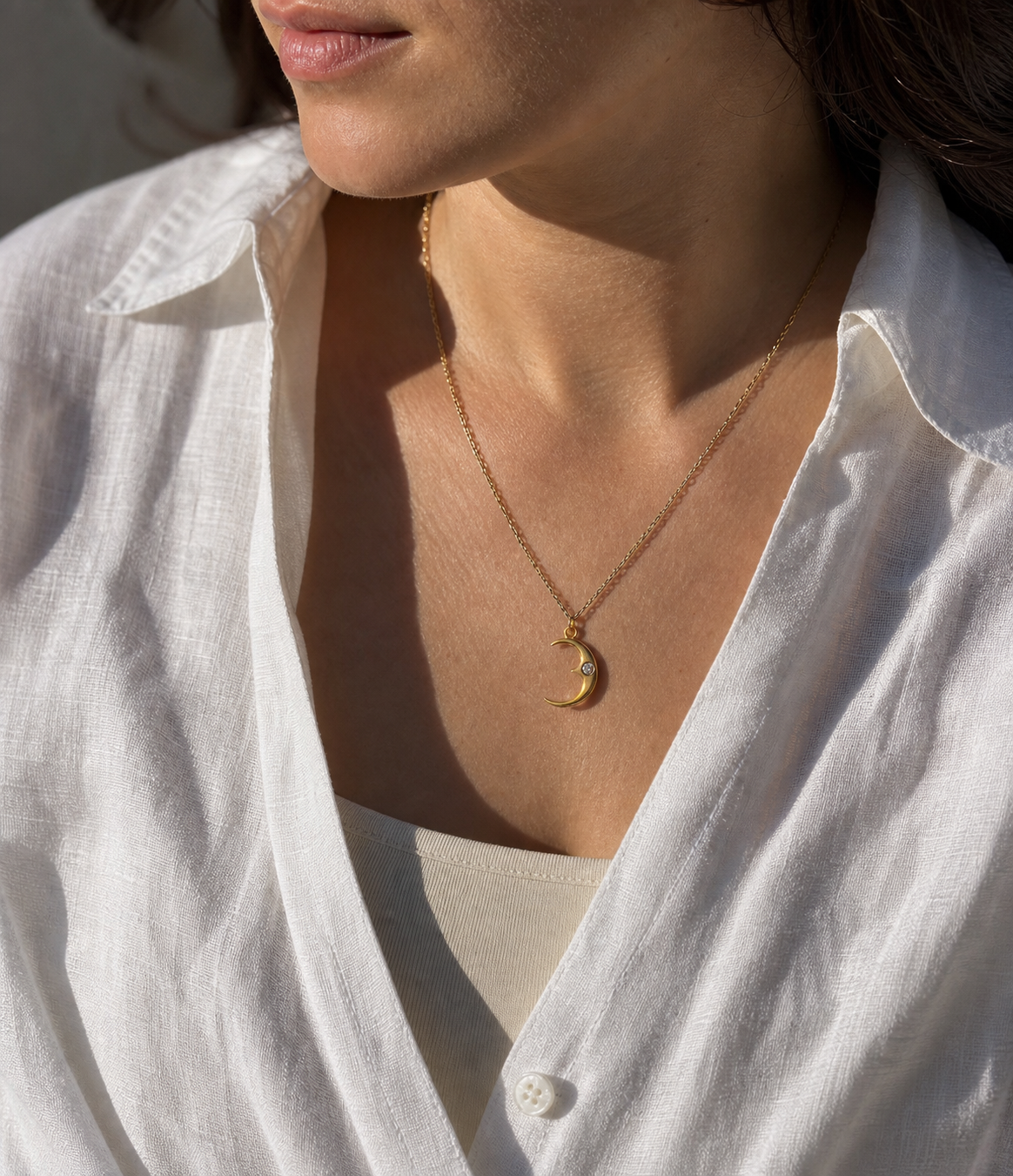 A second photographic styling view of Nightfall Crescent Necklace