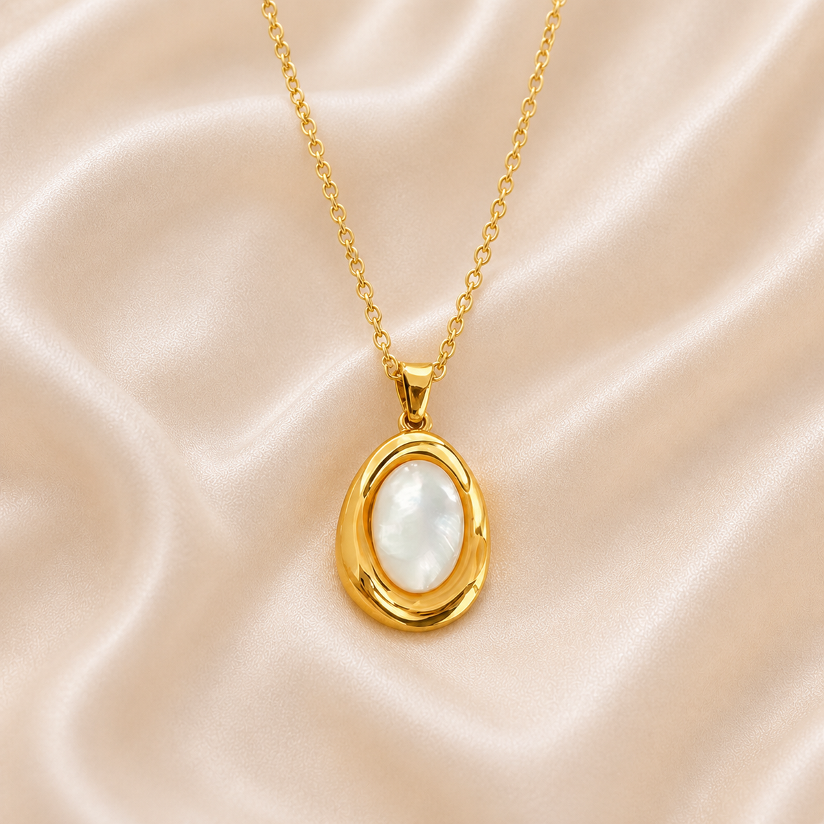 Pale Cameo Shell Pendant Necklace styled on Moonveil warm cream silk