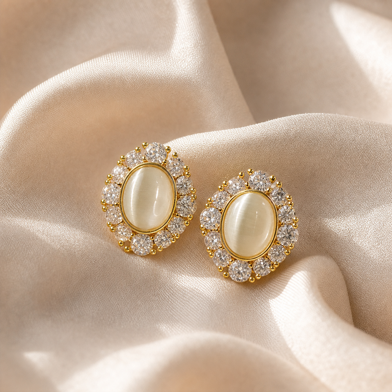 Pale Gaze Halo Stud Earrings styled on Moonveil warm cream silk