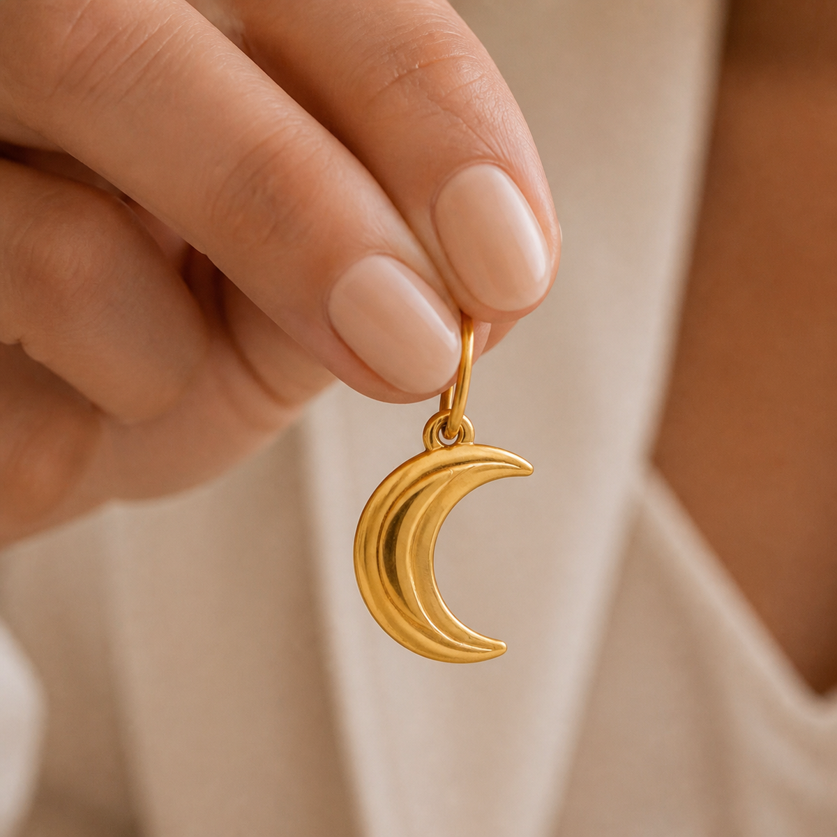Sculpted Moon Charm worn in a natural editorial portrait