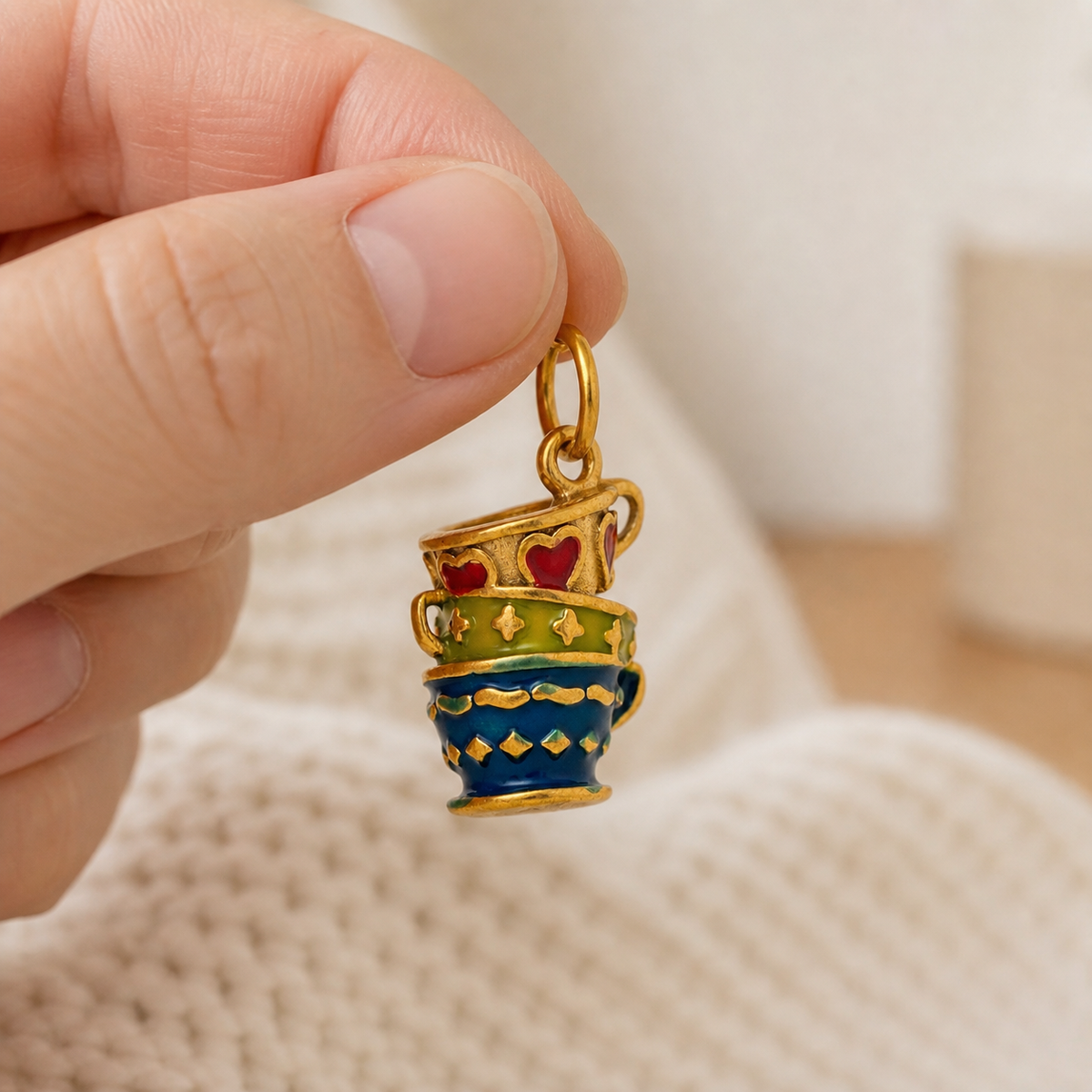 The Enamel Teacup Pendant worn in a natural editorial portrait