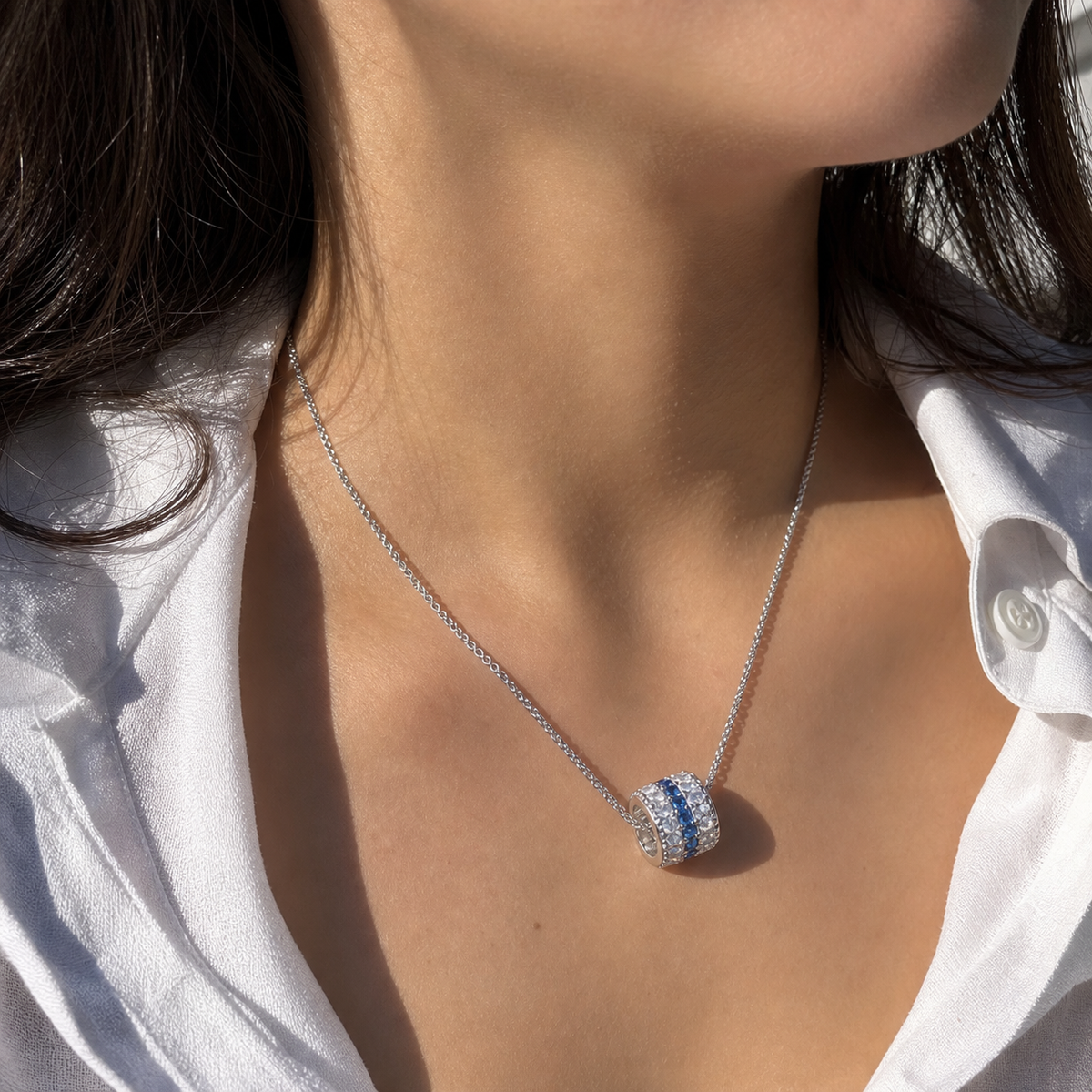 A second photographic styling view of Tidal Arc Pavé Necklace