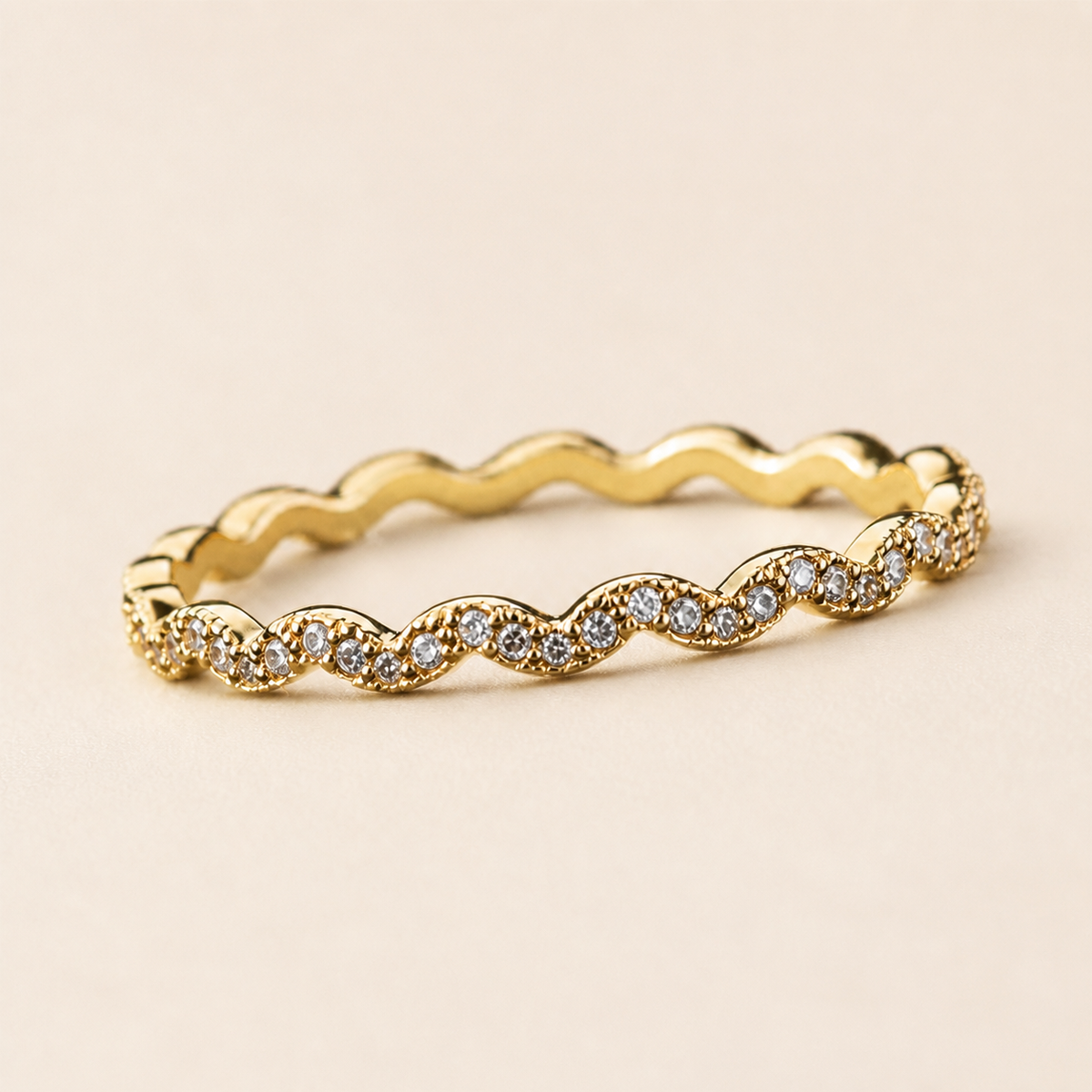 Close-up of Twisted Dew Ring showing its design and finish