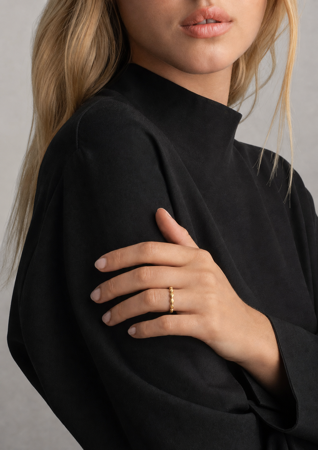 A second photographic styling view of Twisted Dew Ring